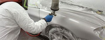 A car getting professionally painted