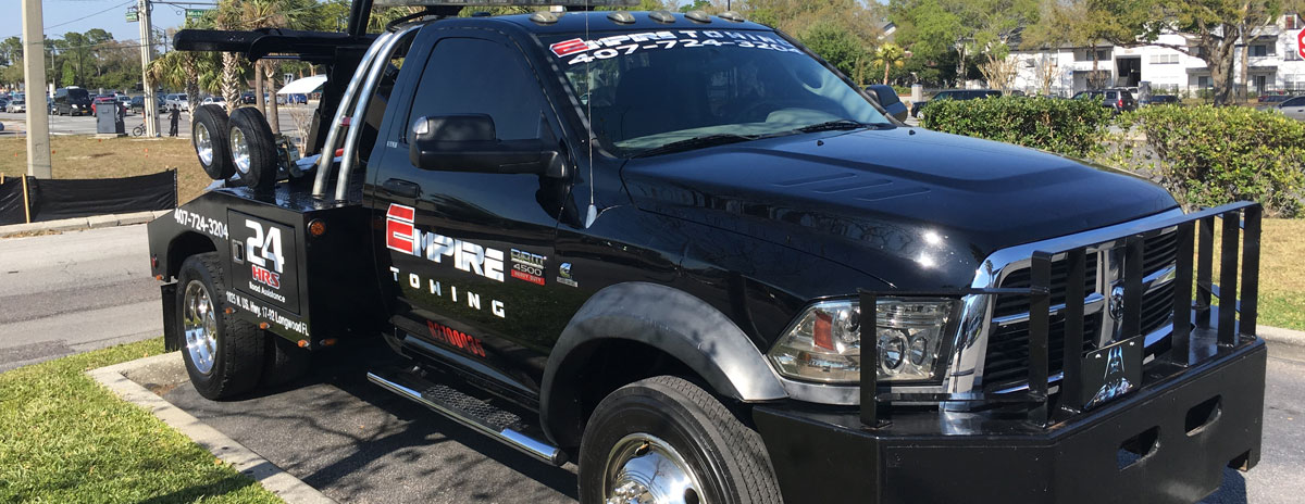 Orlando Towing Service Black Tow Truck Three 
                            Quarters View